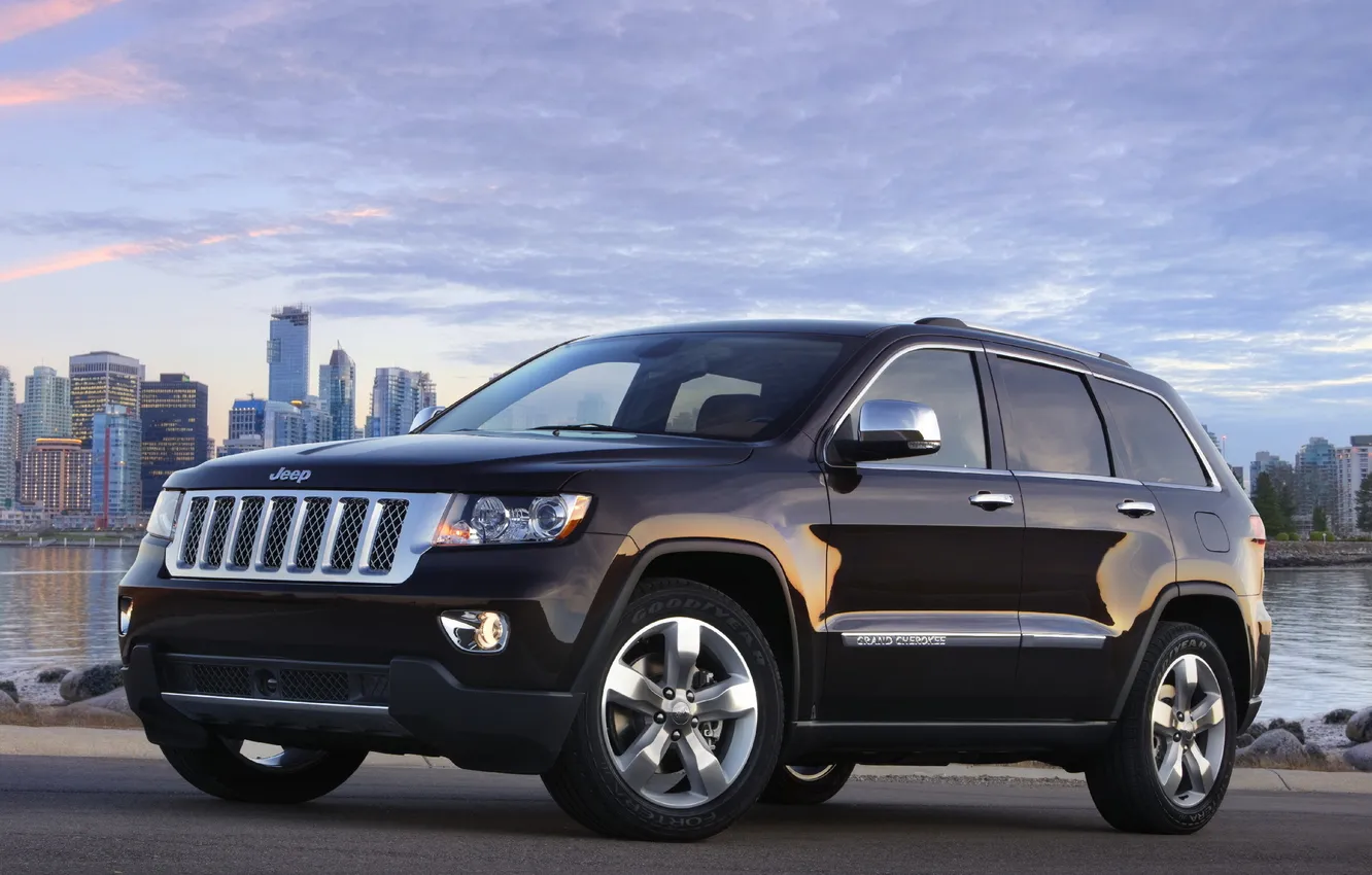 Photo wallpaper the sky, clouds, black, skyscrapers, jeep, SUV, the front, Jeep