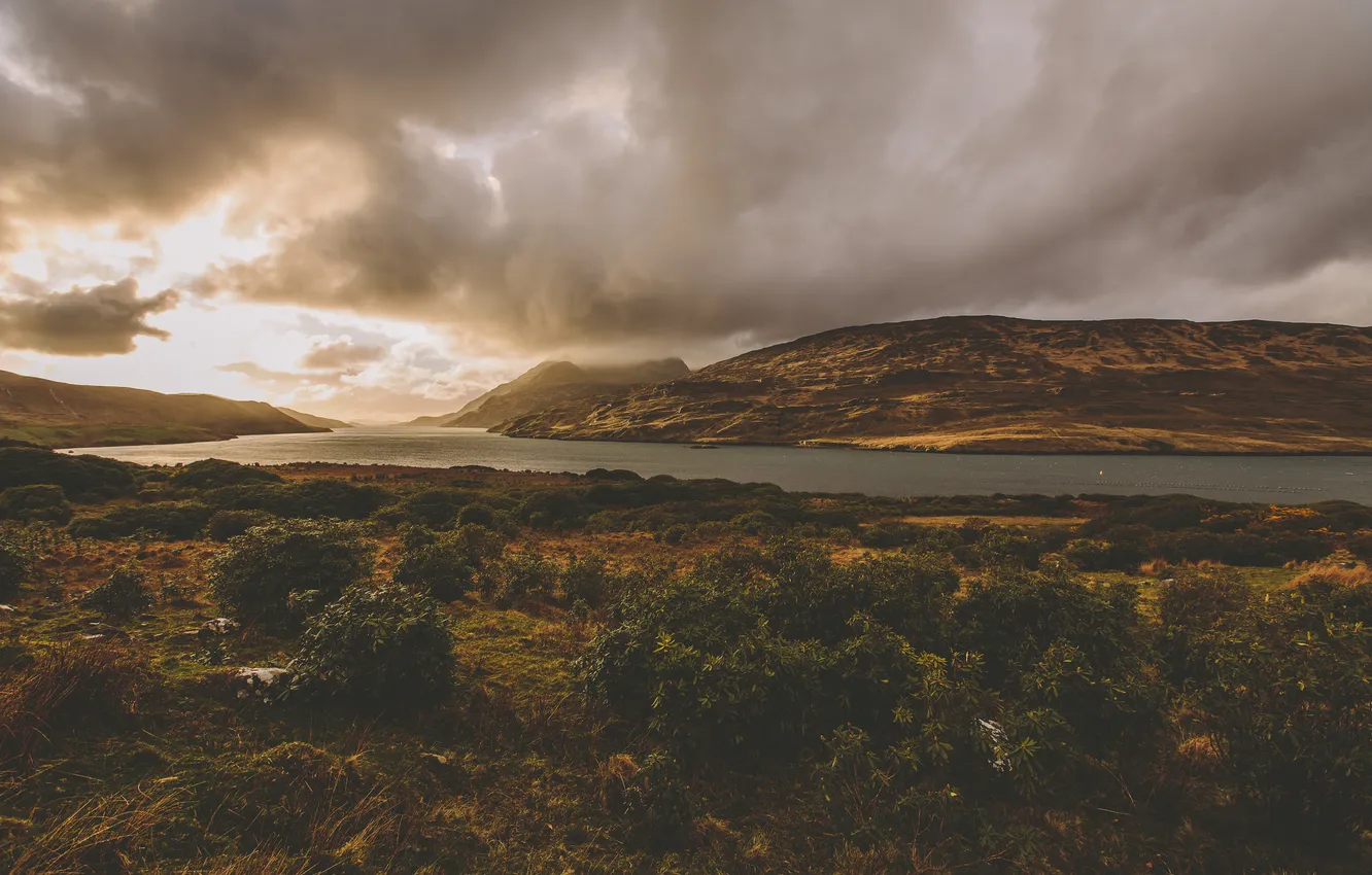 Photo wallpaper clouds, lake, hills, the bushes, sunlight, rainy