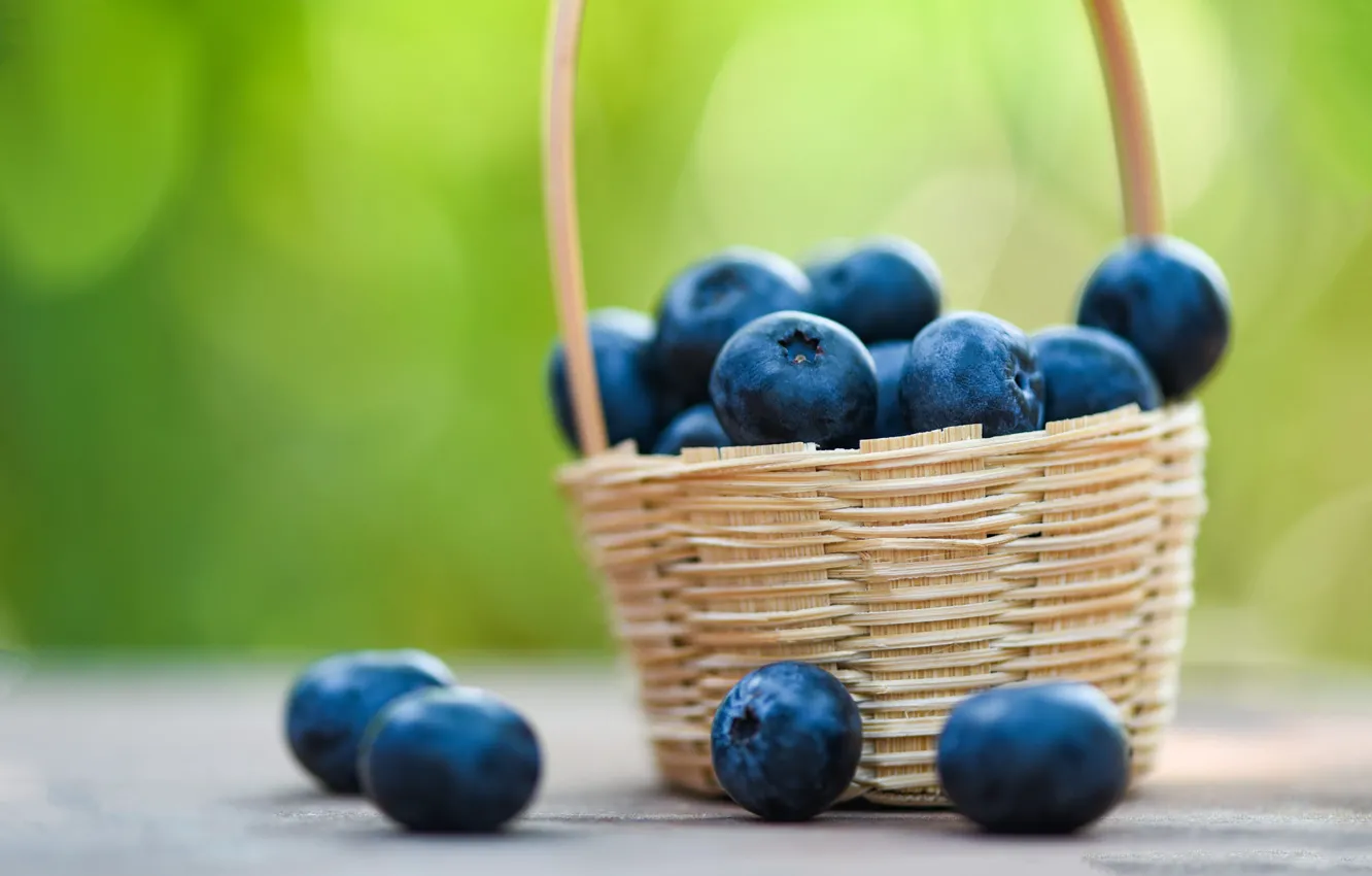 Photo wallpaper green, berries, table, background, food, blueberries, basket, bokeh