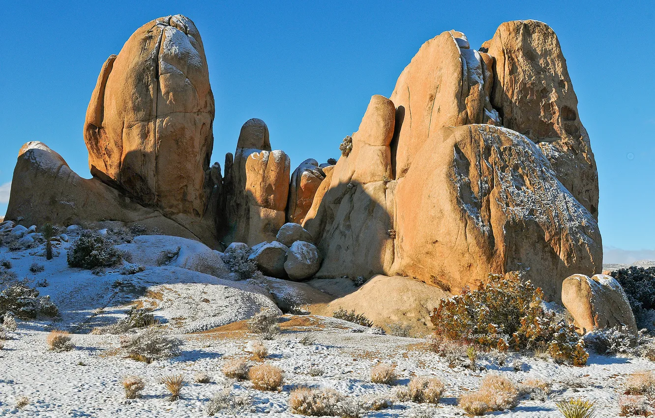 Photo wallpaper the sky, snow, stones, rocks