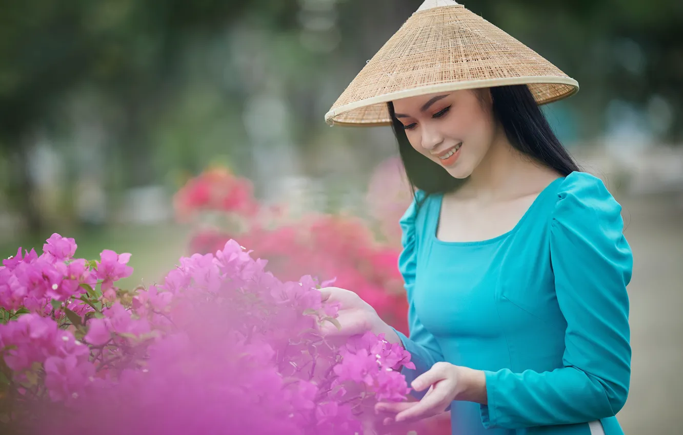 Photo wallpaper girl, flowers, branches, nature, face, pose, smile, Park