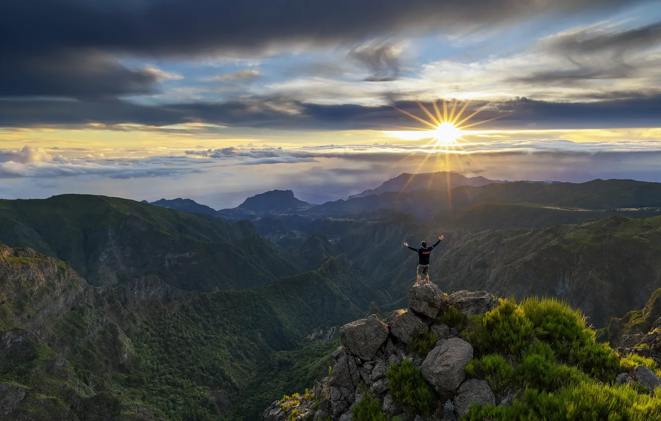 Photo wallpaper the sun, clouds, mountains, pose, stones, open, people, height