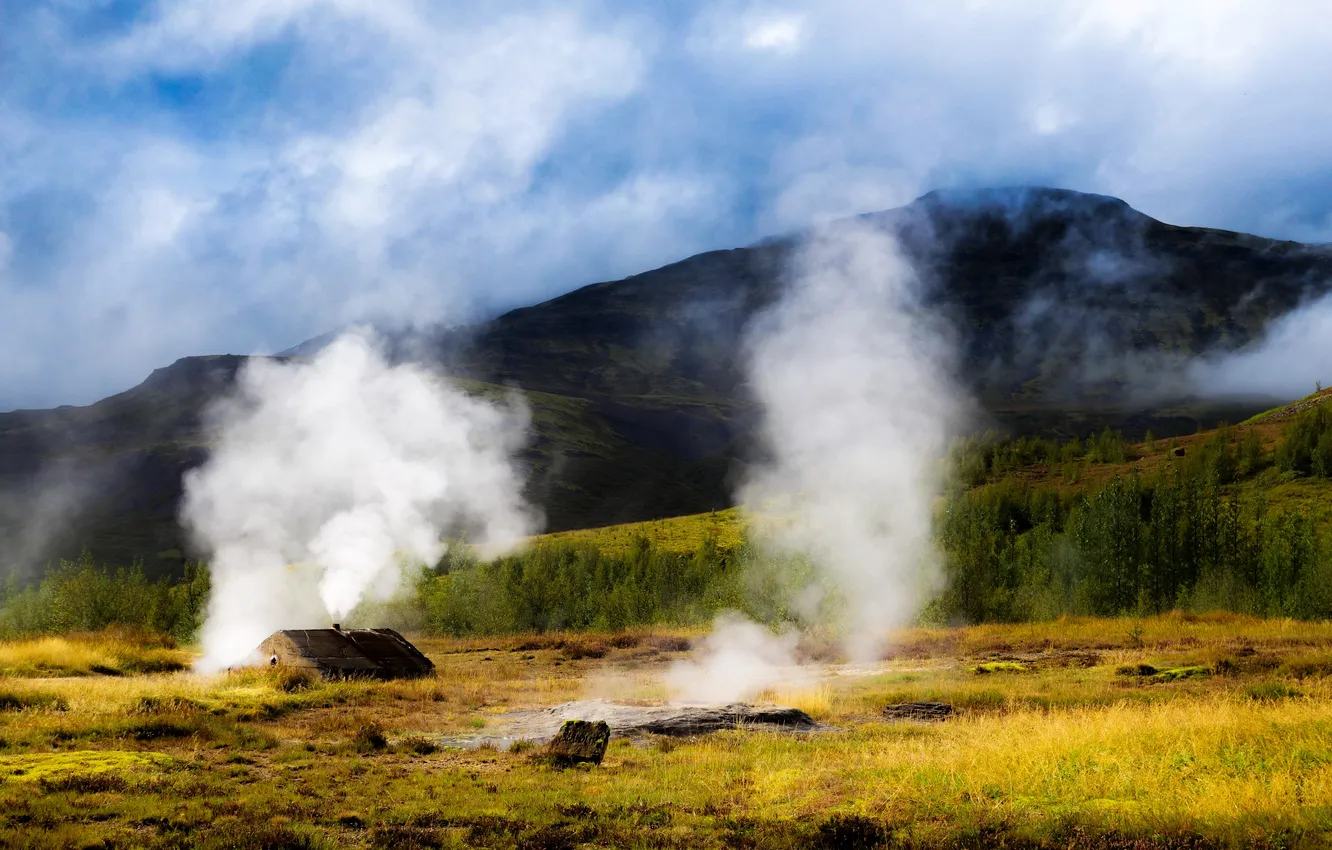 Photo wallpaper grass, mountains, smoke, field, house, Iceland, the bushes