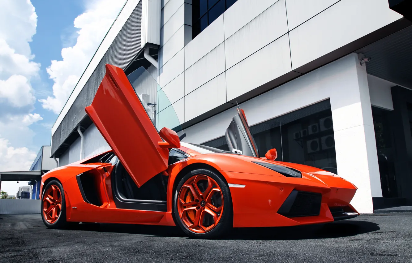 Photo wallpaper the sky, orange, the building, Lamborghini, supercar, supercar, sky, orange