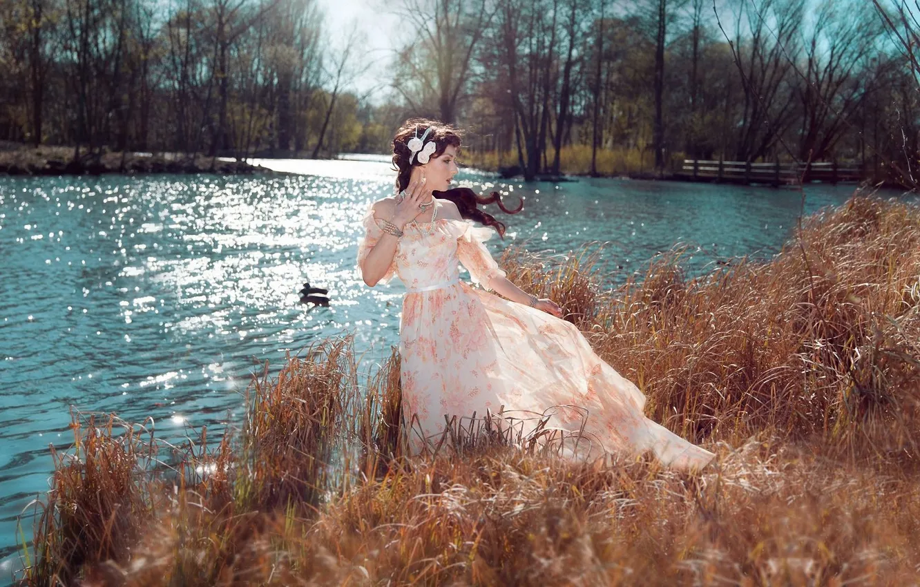 Photo wallpaper autumn, grass, girl, river, the wind, duck, hairstyle, brown hair
