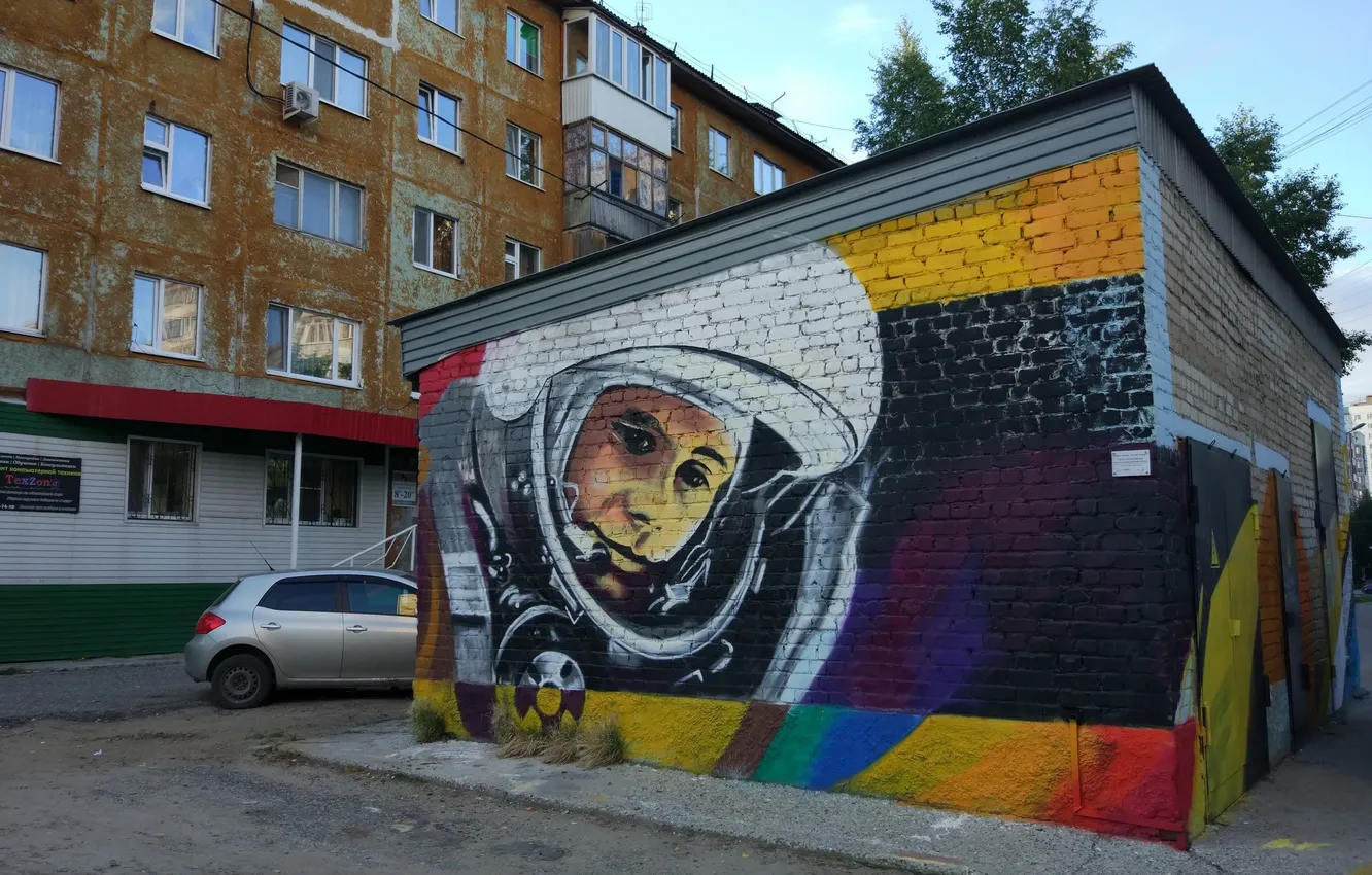 Photo wallpaper city, the city, street, building, astronaut, street, buildings, Yuri Gagarin