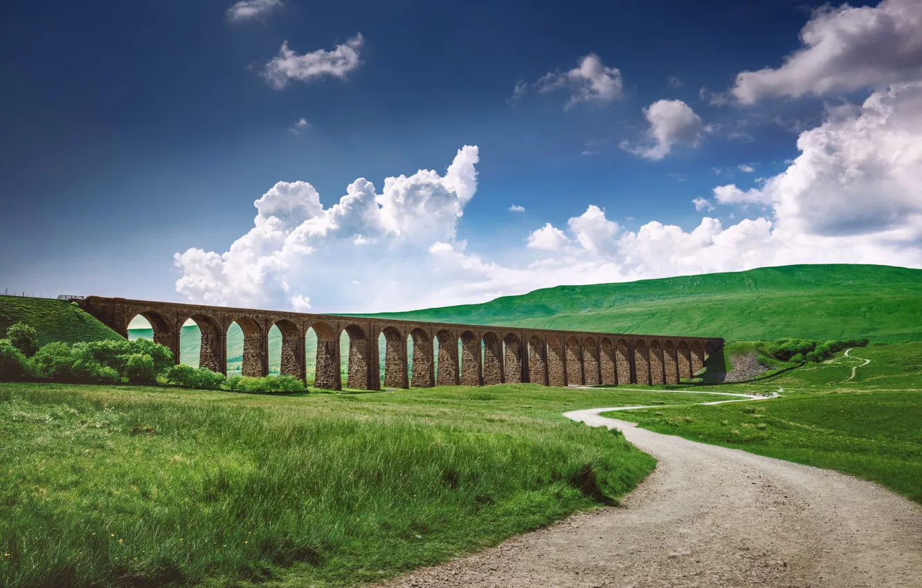 Photo wallpaper clouds, hills, arch, viaduct