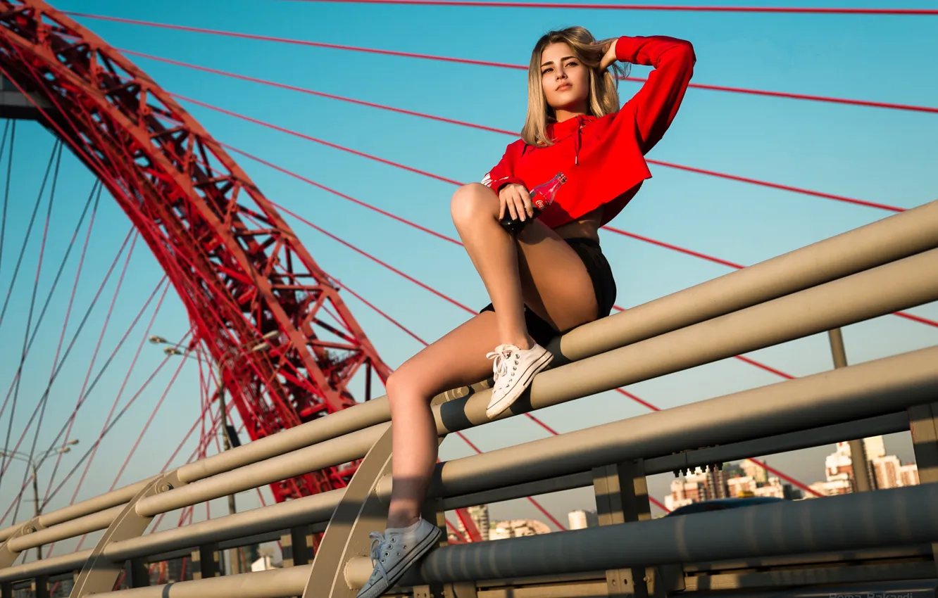 Photo wallpaper the sky, the sun, pose, model, shorts, bottle, sneakers, portrait