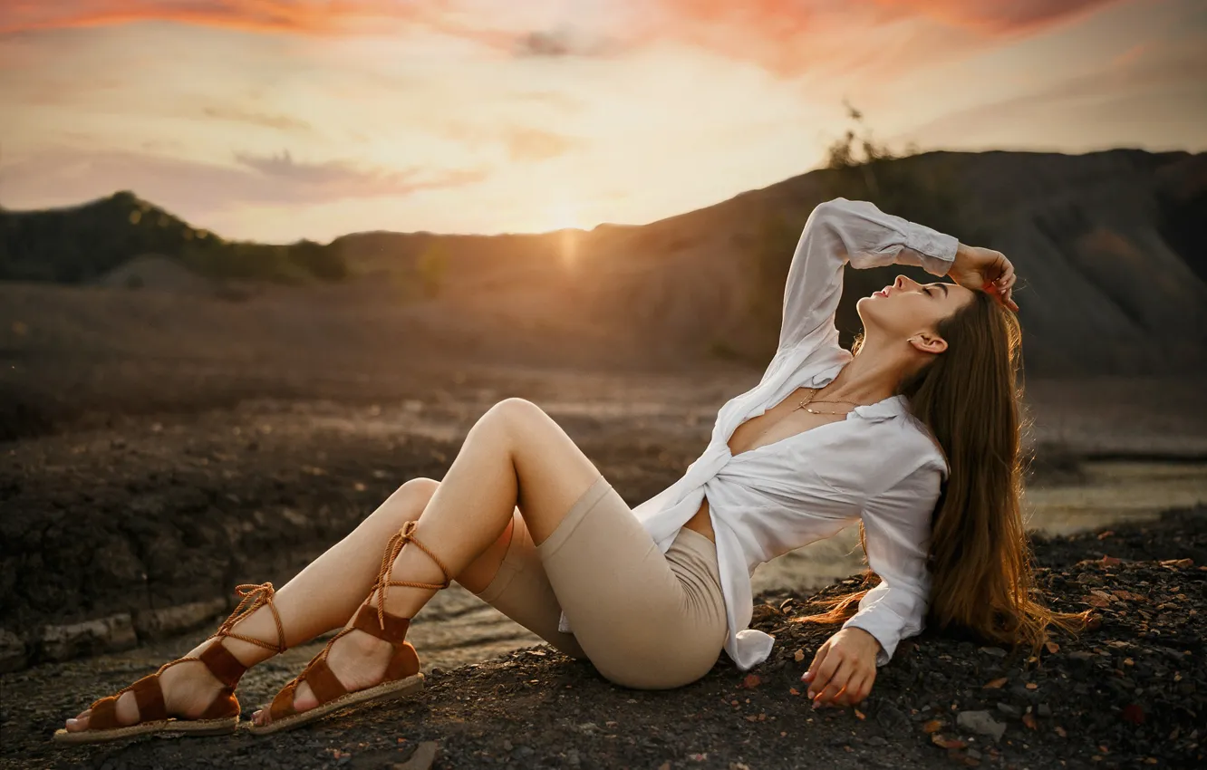 Photo wallpaper girl, landscape, sunset, mountains, pose, shorts, blouse, red