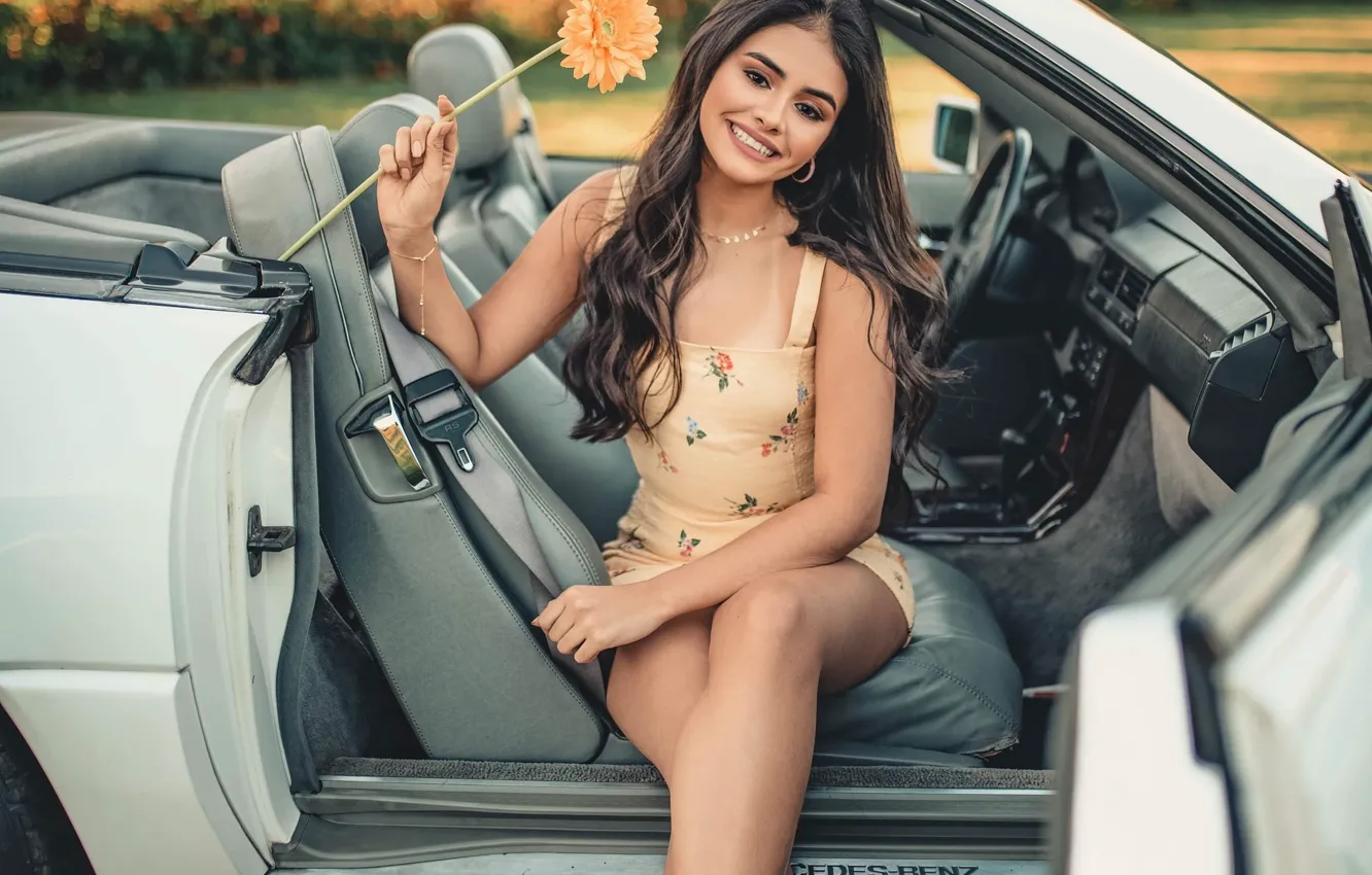 Photo wallpaper girl, flowers, smile, dress, brunette, convertible, car
