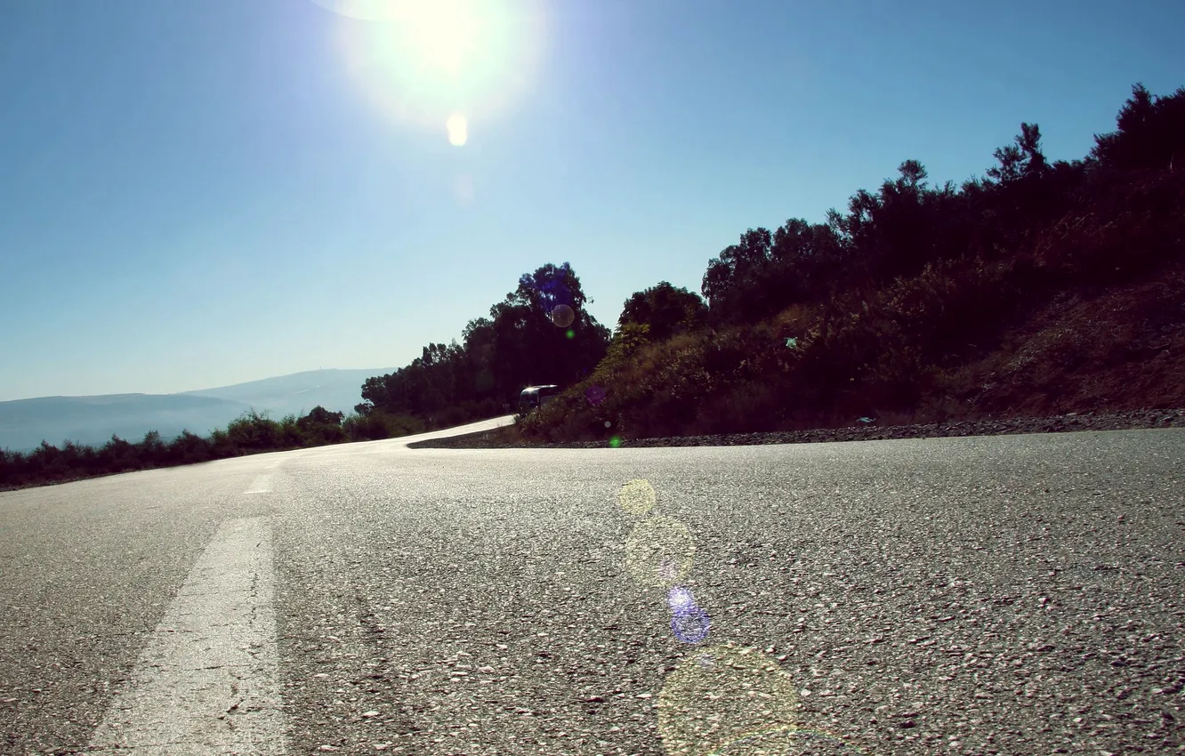 Photo wallpaper road, the sky, the sun, rays, landscape, nature, markup, turn