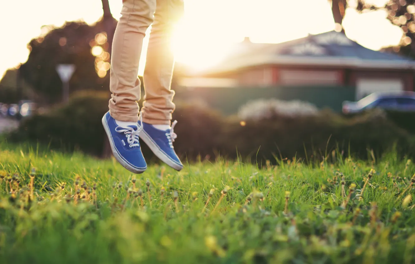 Photo wallpaper grass, light, feet, sneakers