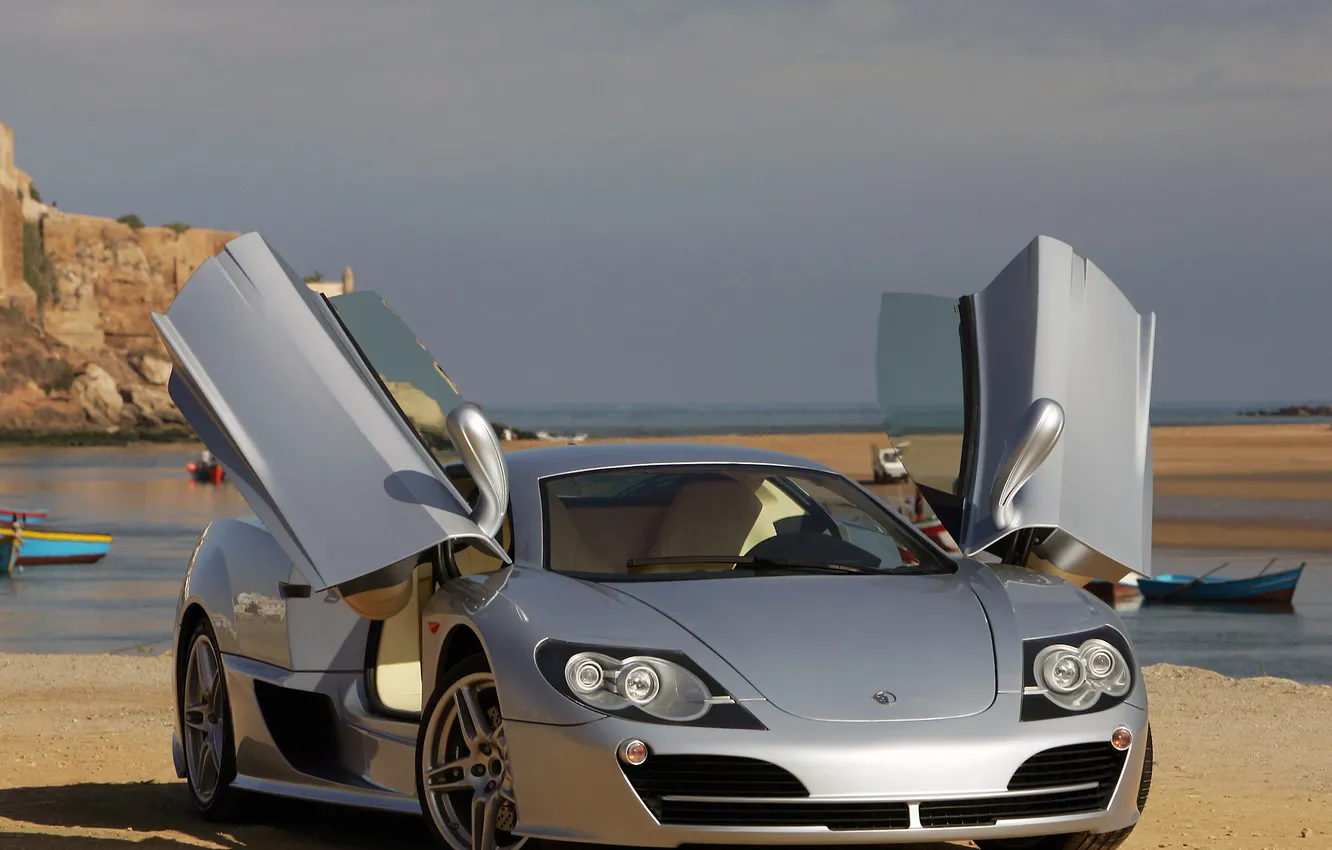 Photo wallpaper sea, rocks, supercar, this particular door