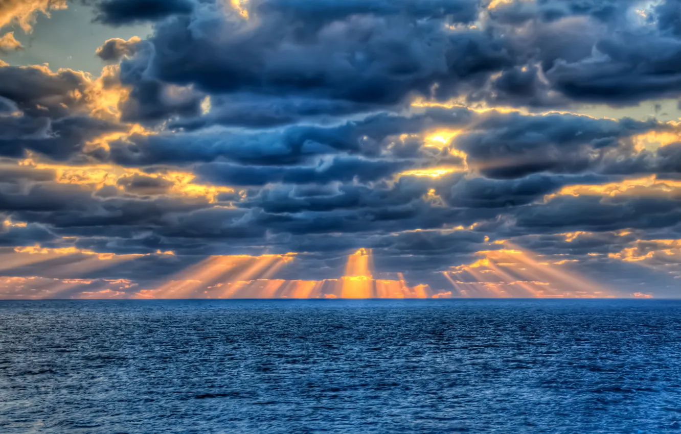 Photo wallpaper sea, the sun, rays, clouds