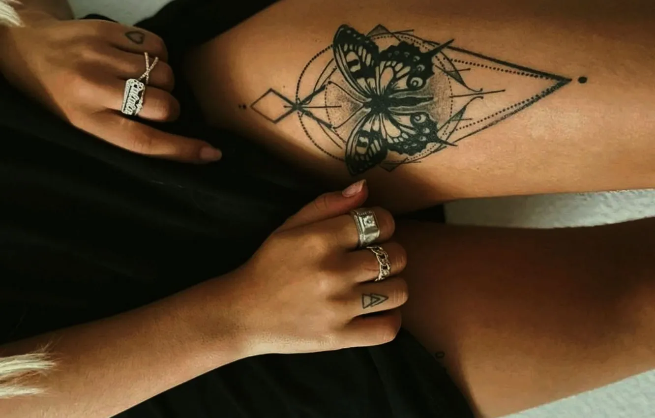 Photo wallpaper girl, tattoo, black dress, slender legs, tattoo on legs, rings on the fingers