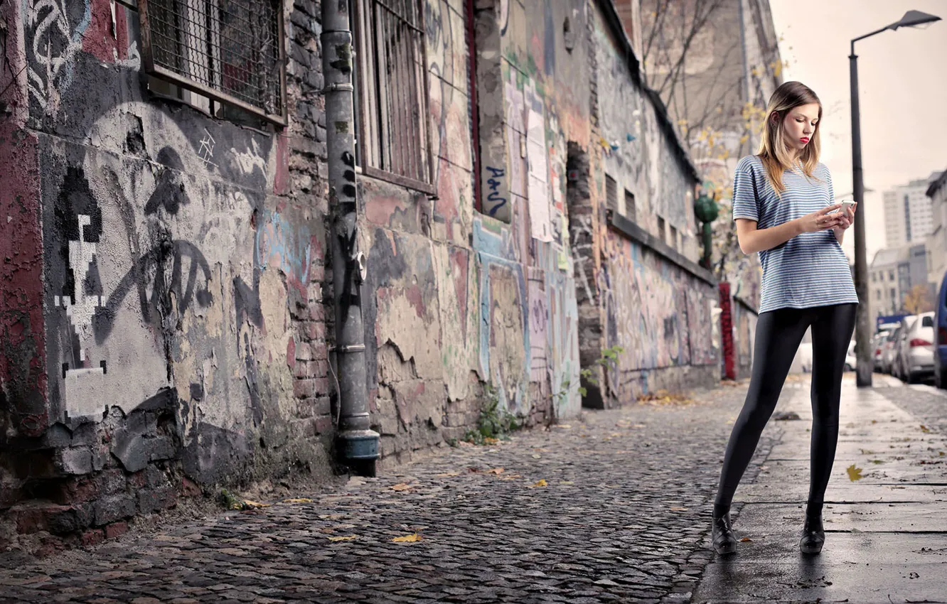 Photo wallpaper girl, the city, street, blonde, phone, the sidewalk, leggings, red lips