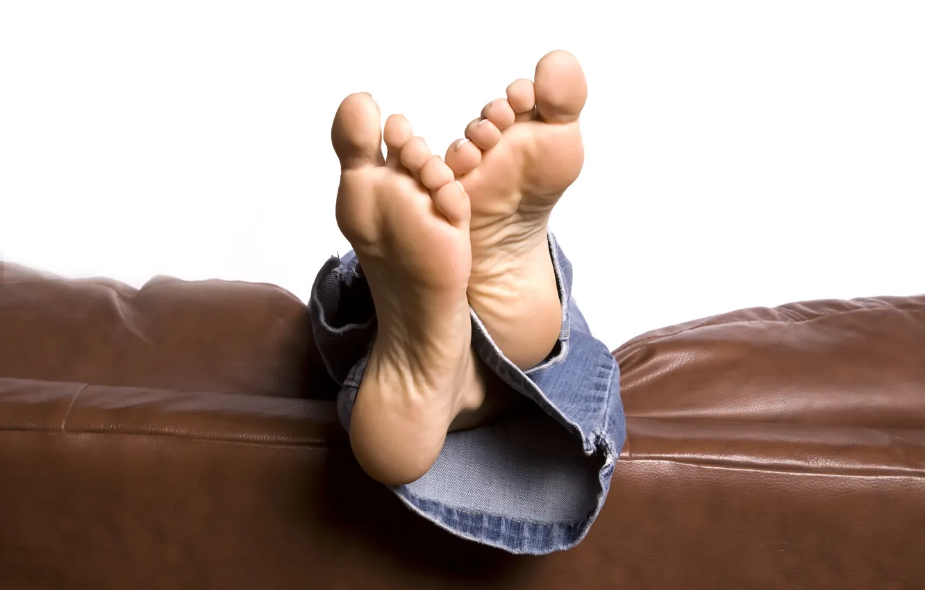 Photo wallpaper jeans, sofa, feet