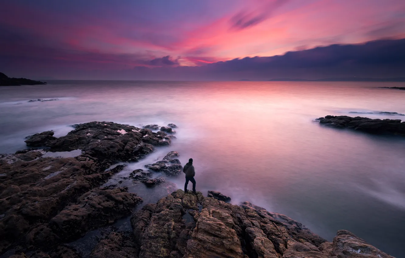 Photo wallpaper sea, the sky, sunset, stones, coast, people, horizon, Spain