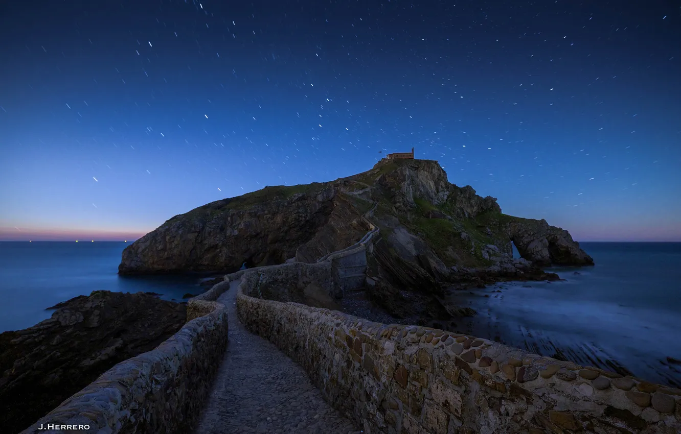 Photo wallpaper road, sea, night, rocks, coast