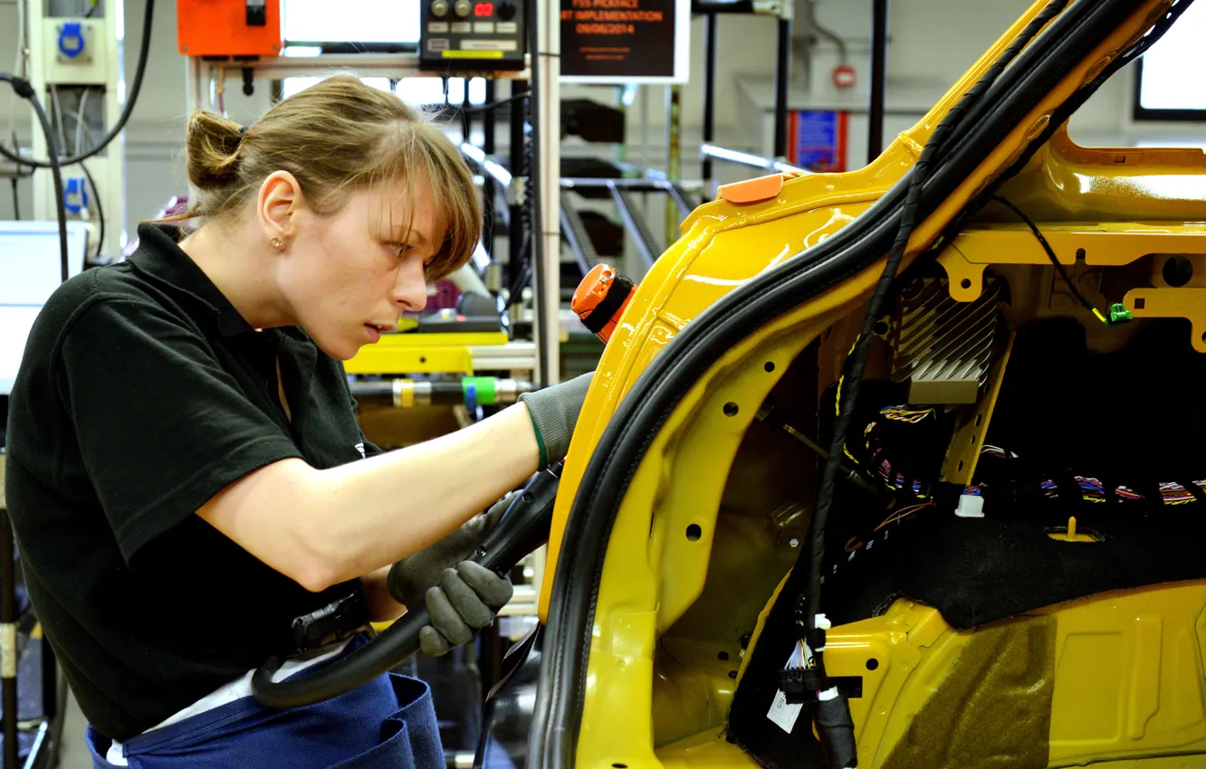 Photo wallpaper woman, vehicle, worker, assembly line