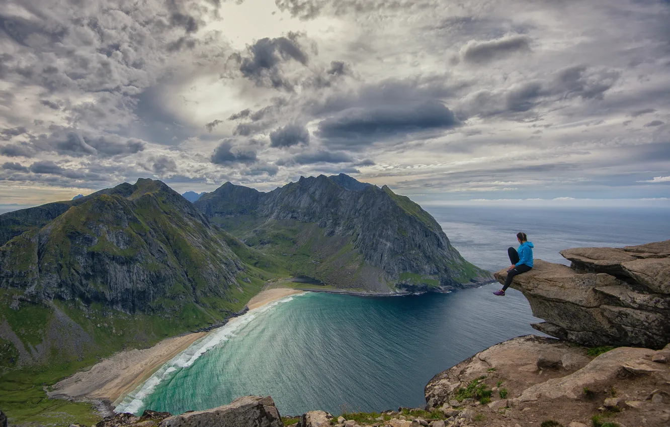 Photo wallpaper sea, the fjord, Rocky mountains, cloudy sky, a girl on the edge of a cliff