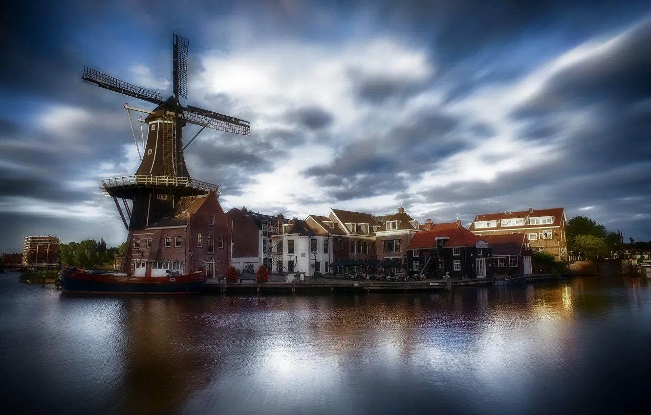 Photo wallpaper the city, river, home, mill, Netherlands, Haarlem, community, The guy near