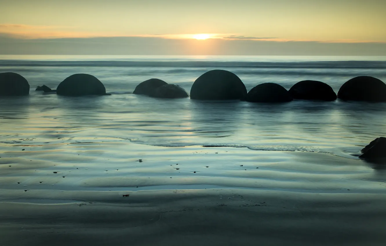 Photo wallpaper sea, wave, beach, the sky, the sun, light, stones, dawn