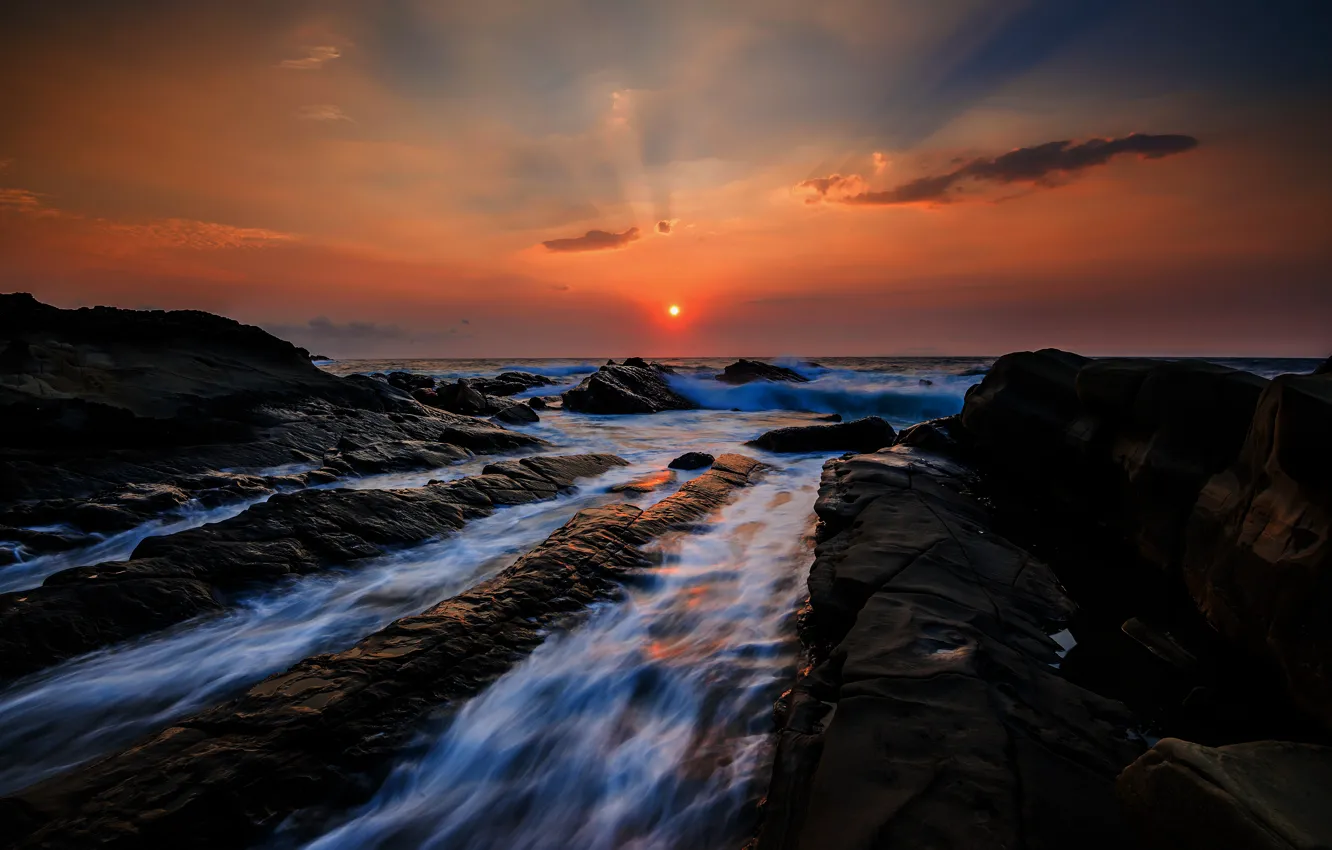 Photo wallpaper sea, the sky, the sun, clouds, rays, sunset, stones, rocks
