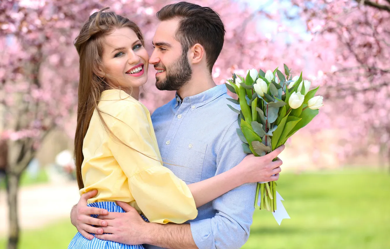 Photo wallpaper girl, trees, flowers, bouquet, spring, garden, pair, tulips