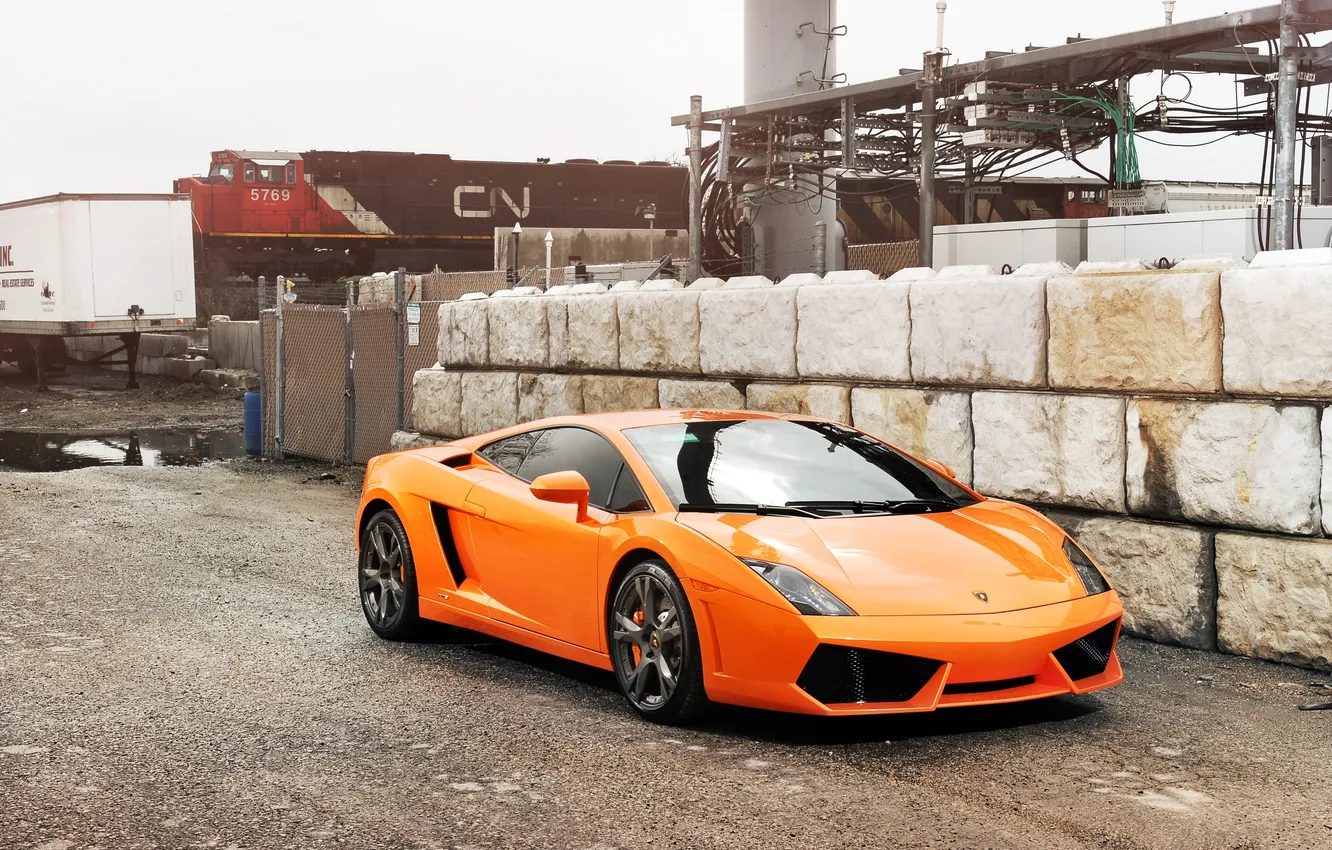 Photo wallpaper the sky, glass, orange, reflection, train, Lamborghini, gate, puddle