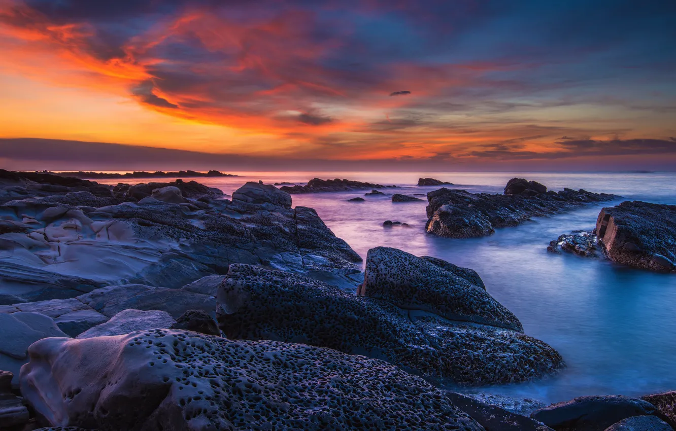 Photo wallpaper sea, the sky, clouds, sunset, blue, stones, rocks, shore