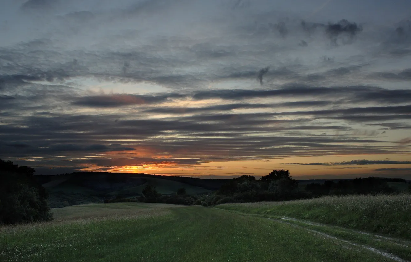 Photo wallpaper road, grass, clouds, hills, Sunset