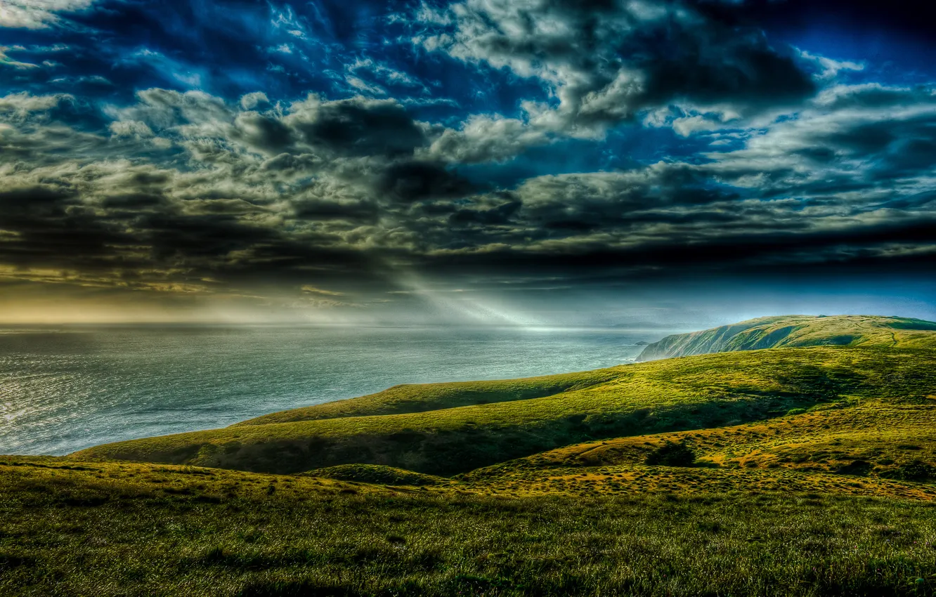 Photo wallpaper sea, grass, clouds, rays, clouds, overcast, shore