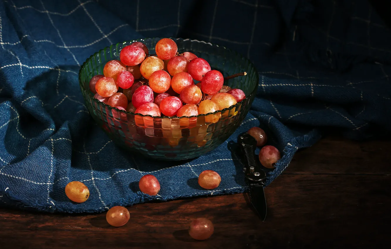 Photo wallpaper red, the dark background, table, towel, grapes, knife, bowl, still life