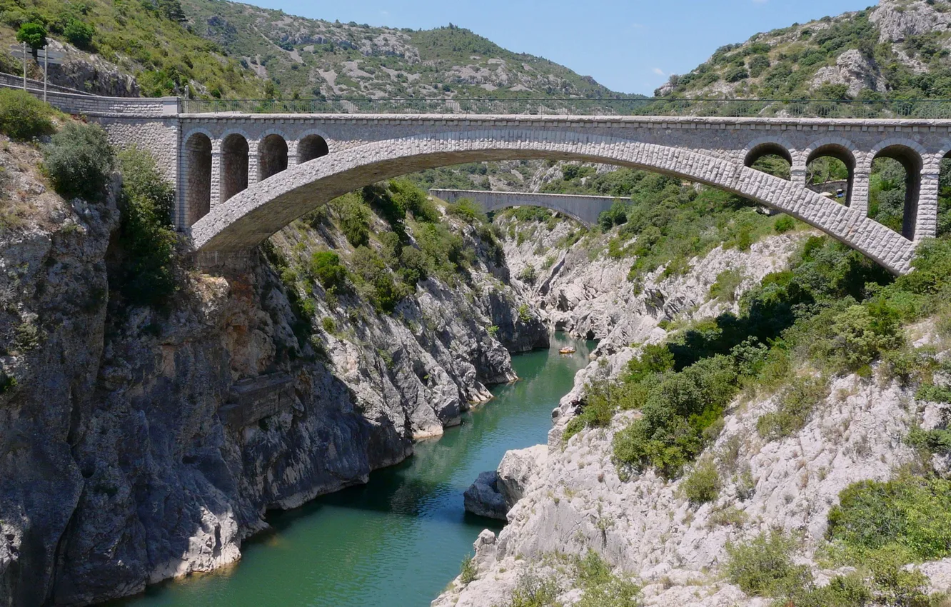 Photo wallpaper the sky, clouds, mountains, bridge, river, canyon