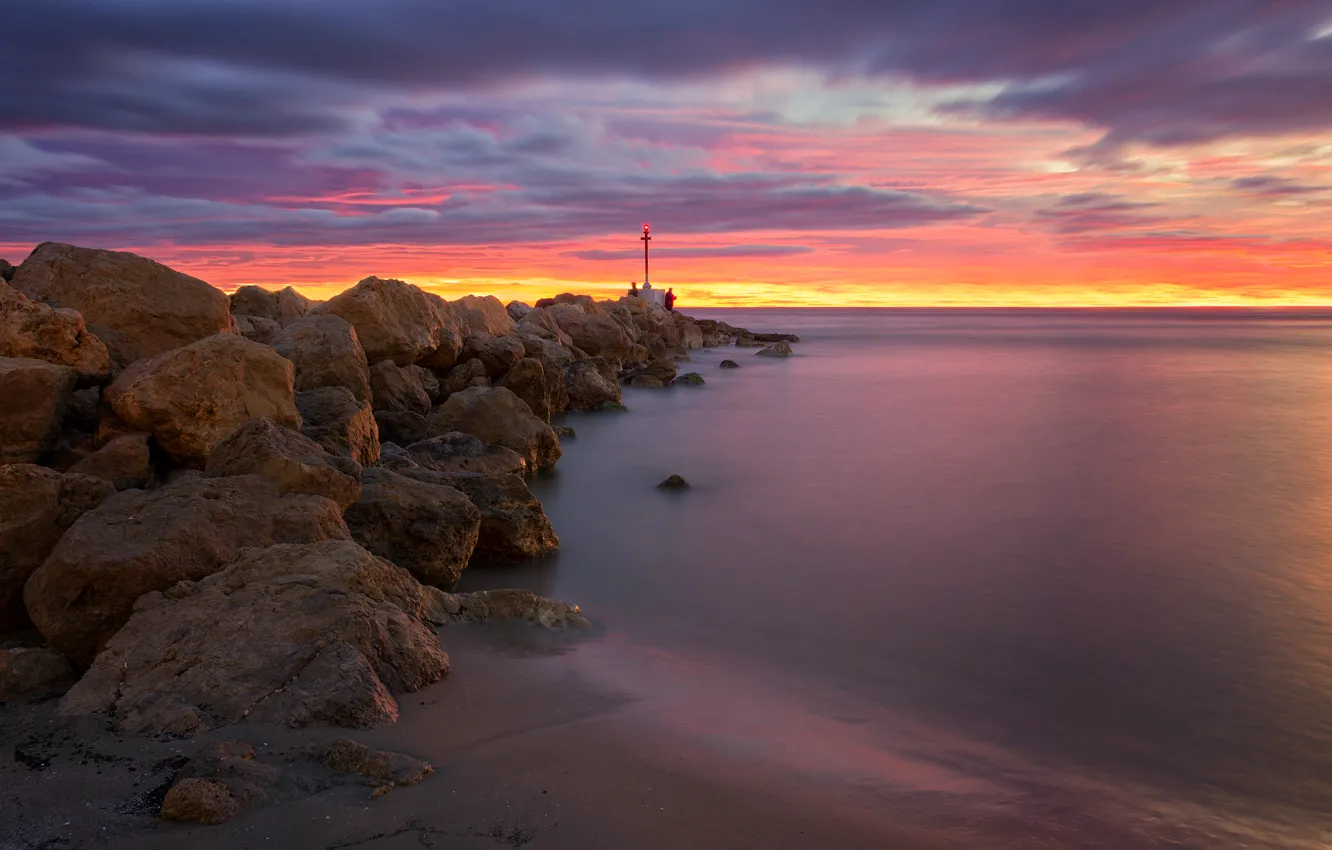 Photo wallpaper sea, sunset, stones, shore, horizon, Spain, Valencia