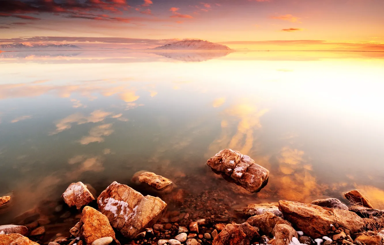 Photo wallpaper sea, mountains, surface, stones, dawn, distant shore