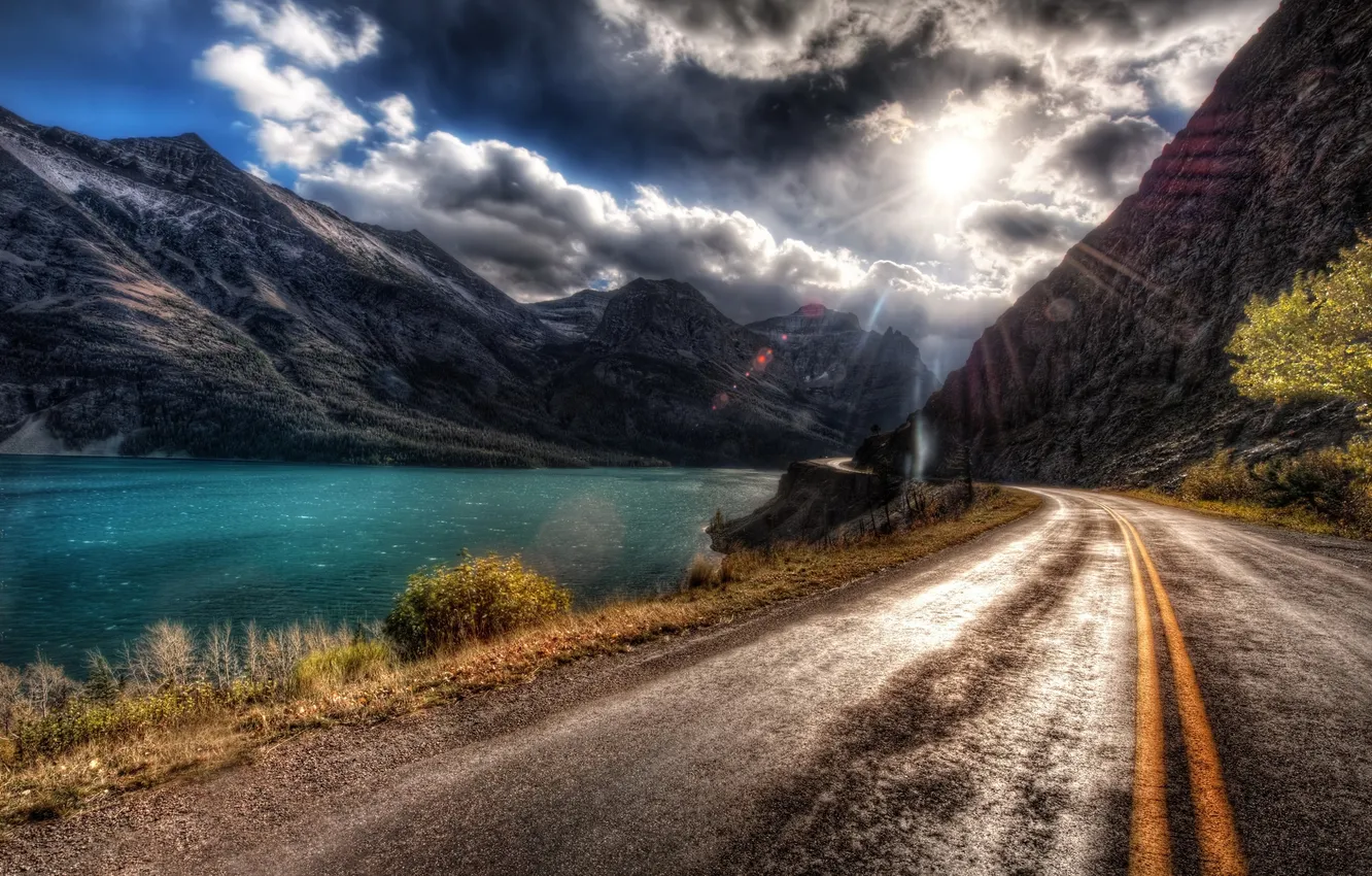 Photo wallpaper road, asphalt, the sun, clouds, light, line, glare, river