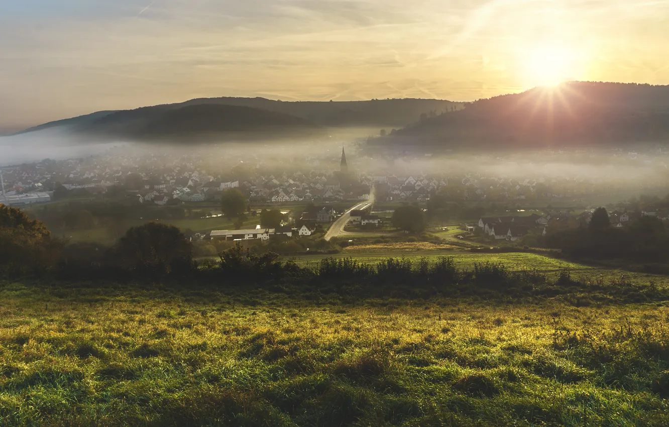 Photo wallpaper road, field, summer, the sky, grass, the sun, rays, mountains