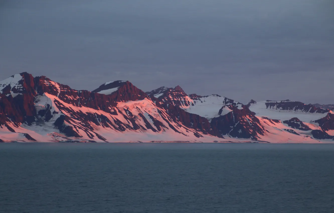 Photo wallpaper sea, the sky, snow, sunset, mountains, nature, rocks, the evening