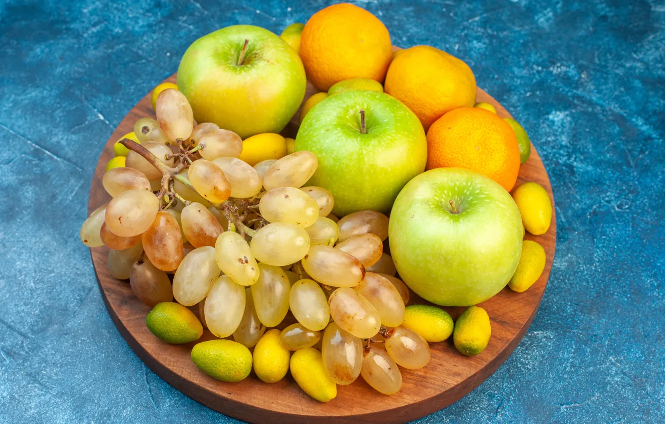 Wallpaper apples, grapes, blue background, tray, tangerines for mobile