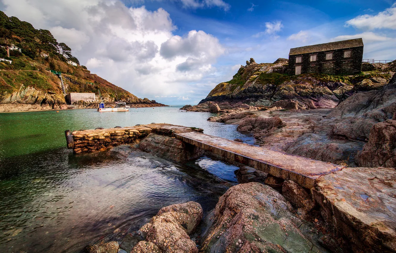 Photo wallpaper the sky, clouds, rocks, England, home, Bay, pier, boat