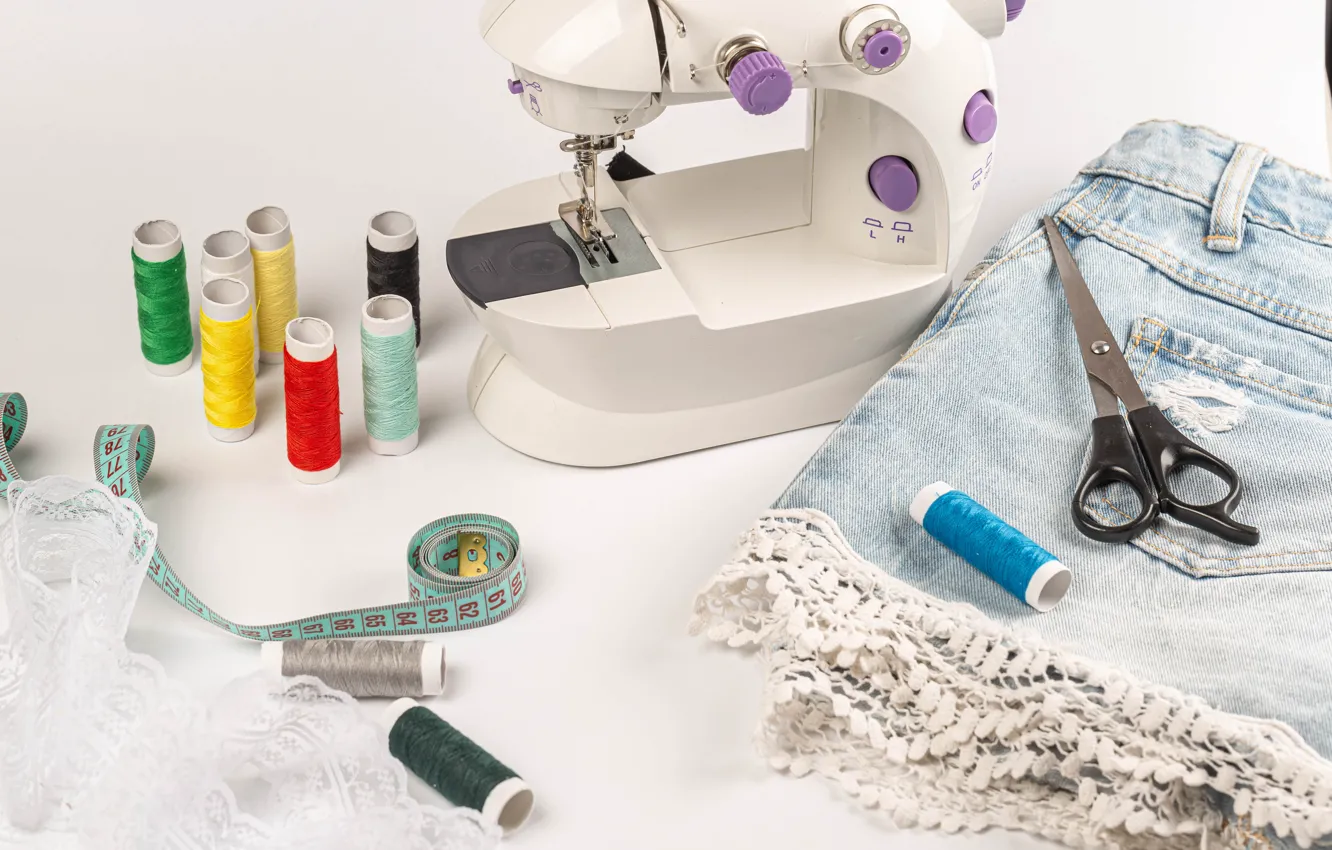Photo wallpaper thread, scissors, denim skirt, centimeter, sewing machine