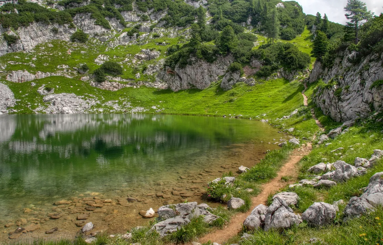 Photo wallpaper greens, grass, mountains, lake, surface, reflection, stones, hills