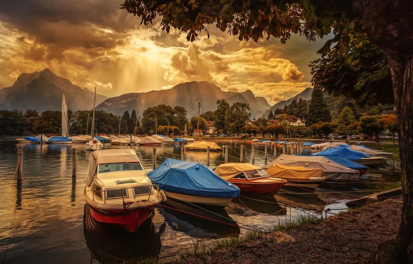 Photo wallpaper clouds, rays, mountains, lake, boat, Switzerland