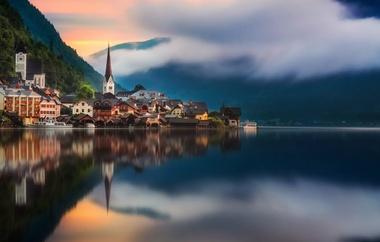 Photo wallpaper clouds, mountains, the city, fog, lake, reflection, shore, building