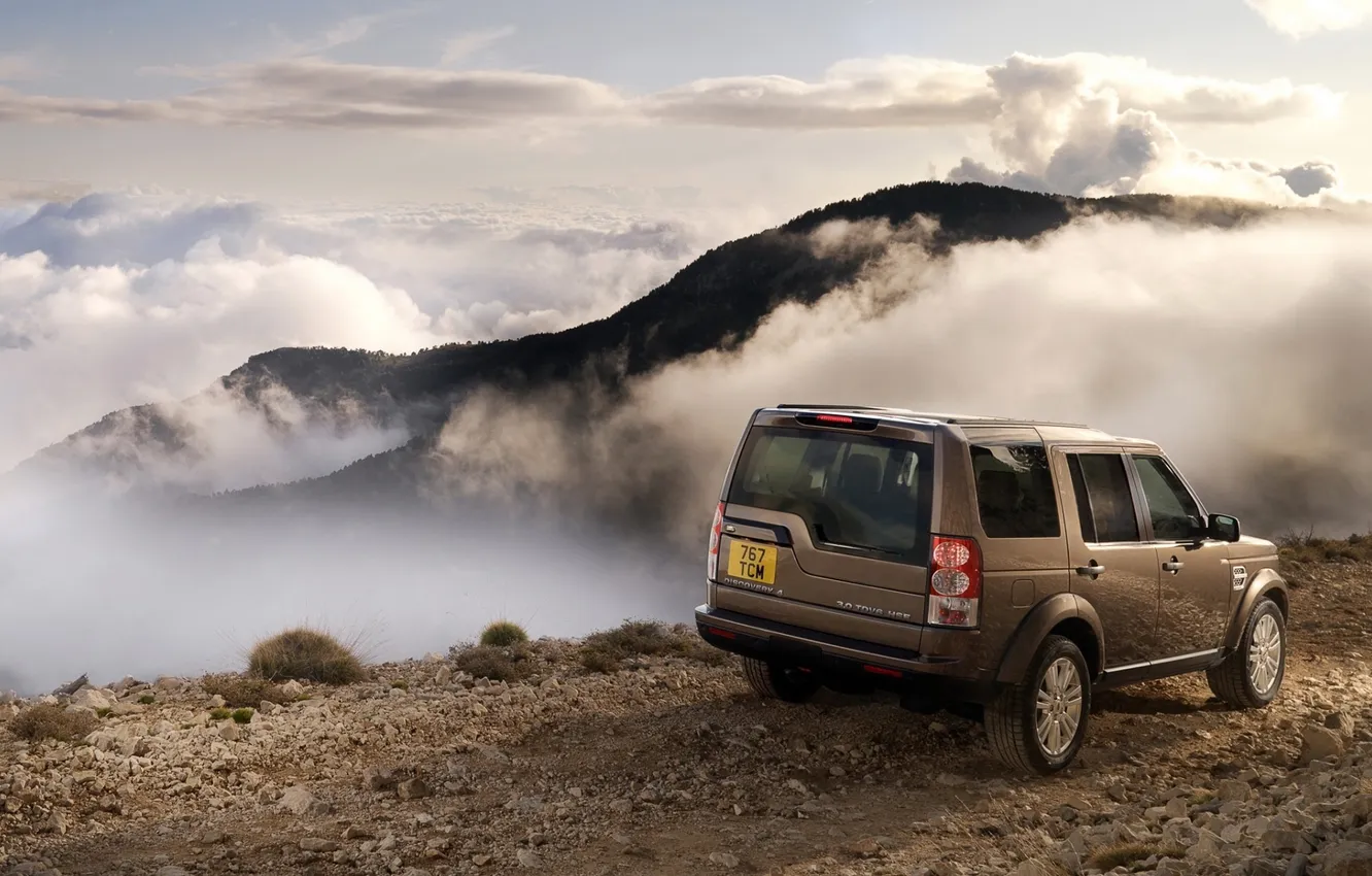 Photo wallpaper road, the sky, clouds, mountains, jeep, SUV, Land Rover, rear view