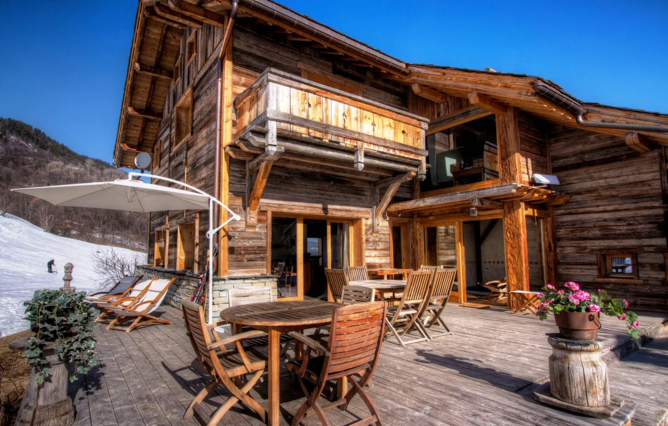 Photo wallpaper winter, snow, flowers, table, interior, wooden, house, chairs. sun loungers