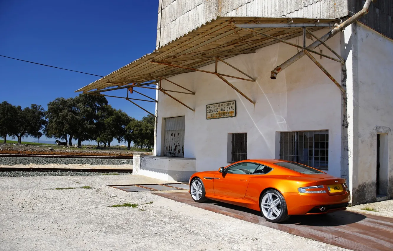Photo wallpaper orange, Aston Martin, building, day, Aston, Coupe, Stratus