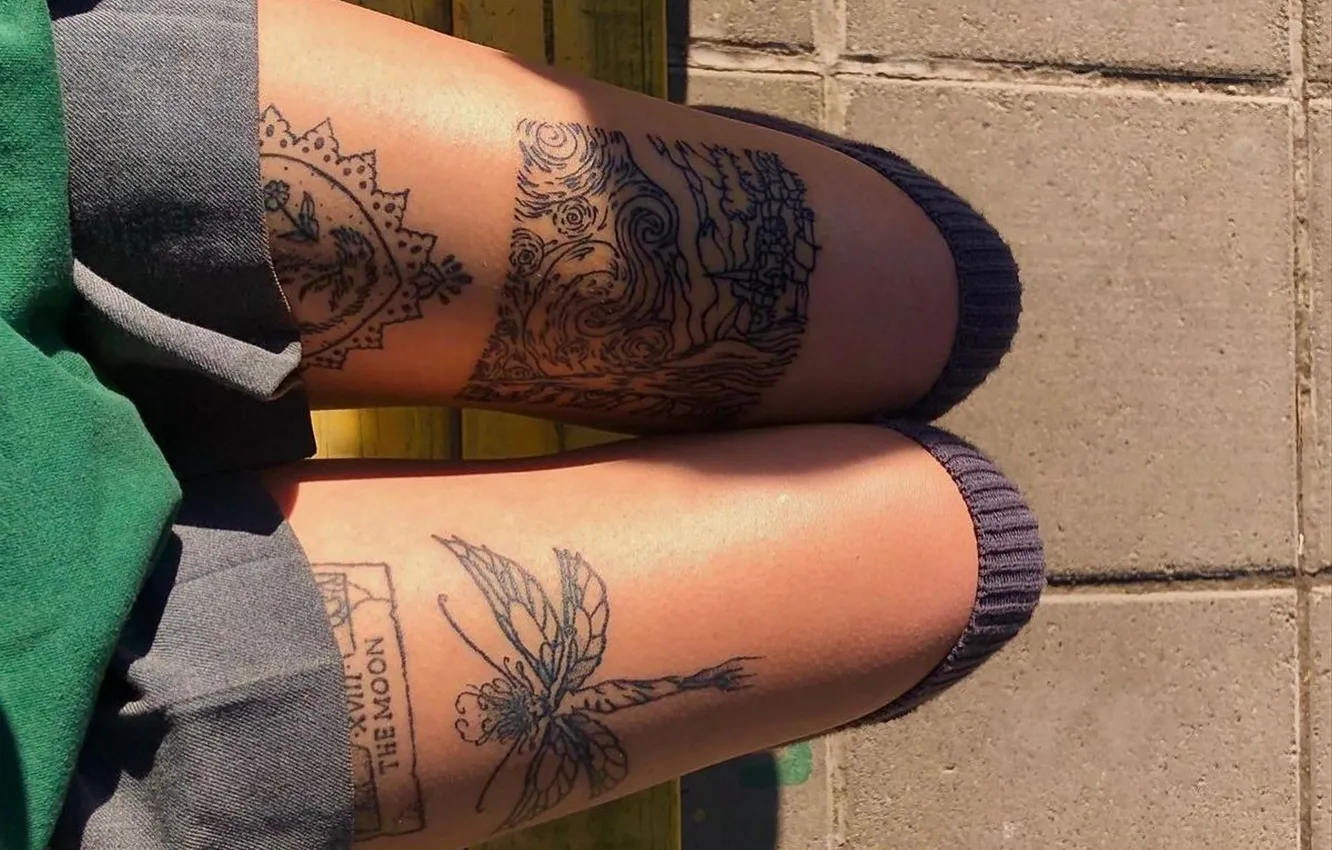 Photo wallpaper girl, black dress, leg warmers, slender legs, tattoos on the legs, tanned legs